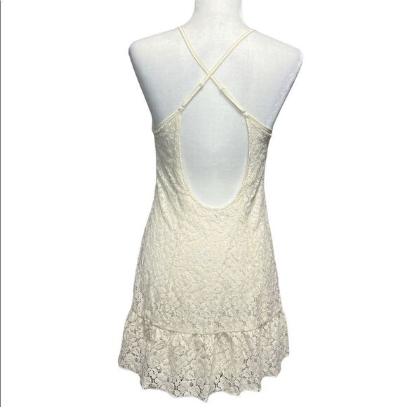 aritzia Talula Shibuya Crisscross Lace Ruffle Hem Eyelet Mini Dress - Picture 6 of 11